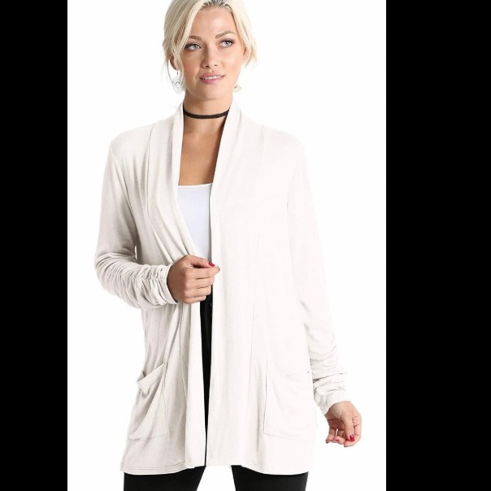 White cardigan with pockets